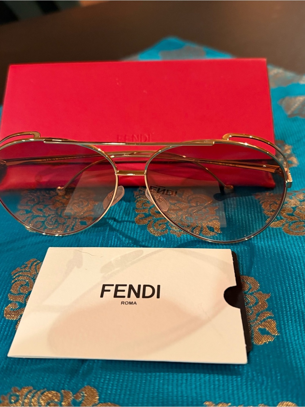 Fendi Gold Frame Aviator Sunglasses with Brown Gradient Lenses